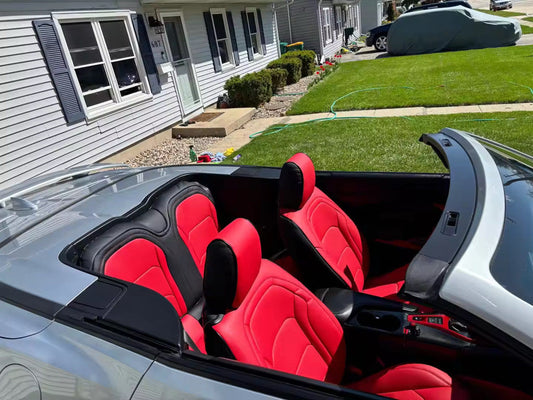 2022 Camaro Coupe with custom red and black artificial nappa leather seat covers in an outdoor setting