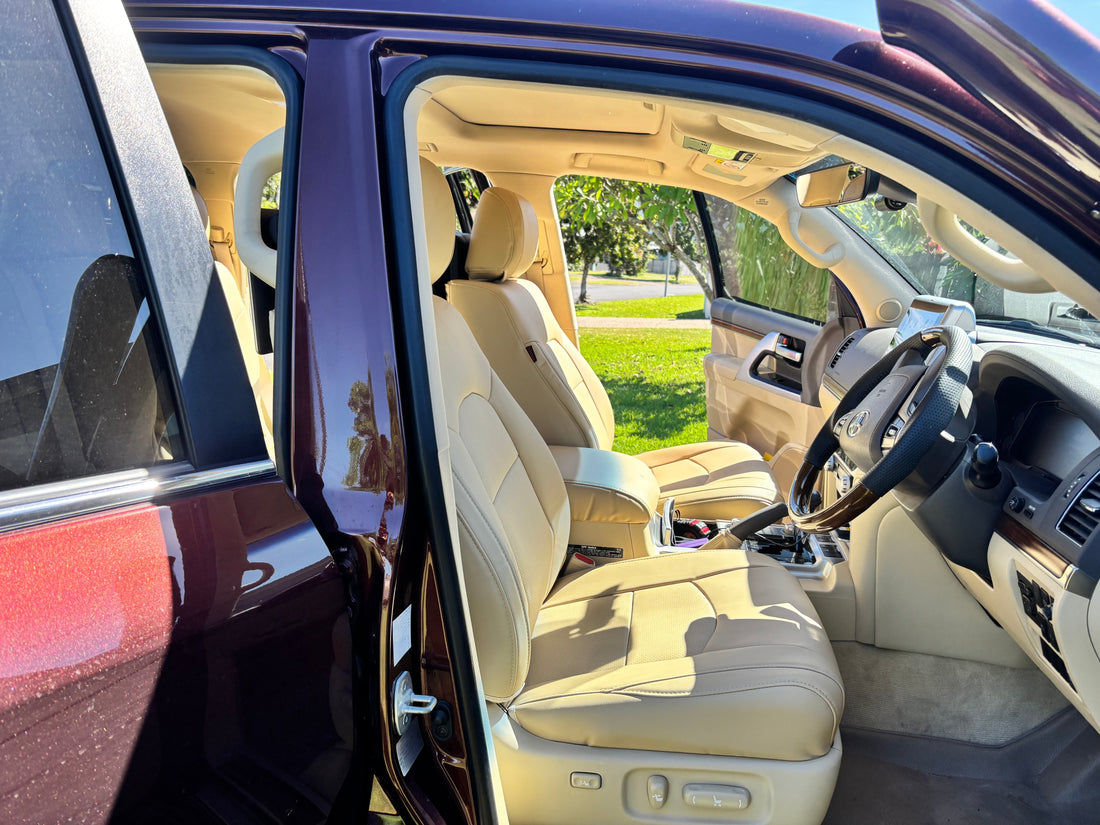 Beige custom-fit car seat covers installed in Toyota Landcruiser 200 Series Sahara front seats