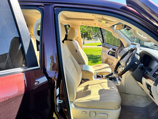 Beige custom-fit car seat covers installed in Toyota Landcruiser 200 Series Sahara front seats