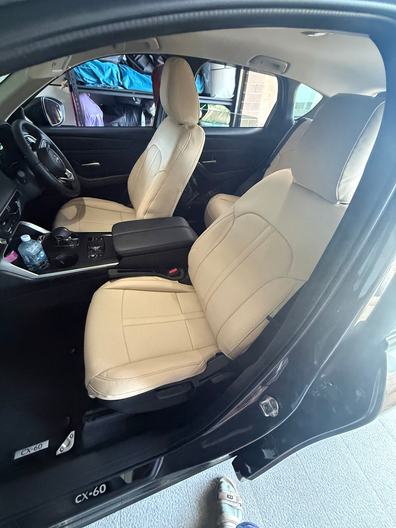 Front beige artificial Nappa leather seat covers installed in a 2025 Mazda CX-60