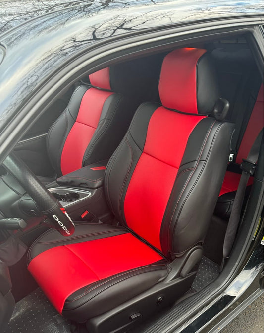 Front seats of 2021 Dodge Challenger with custom red and black artificial Nappa leather seat covers