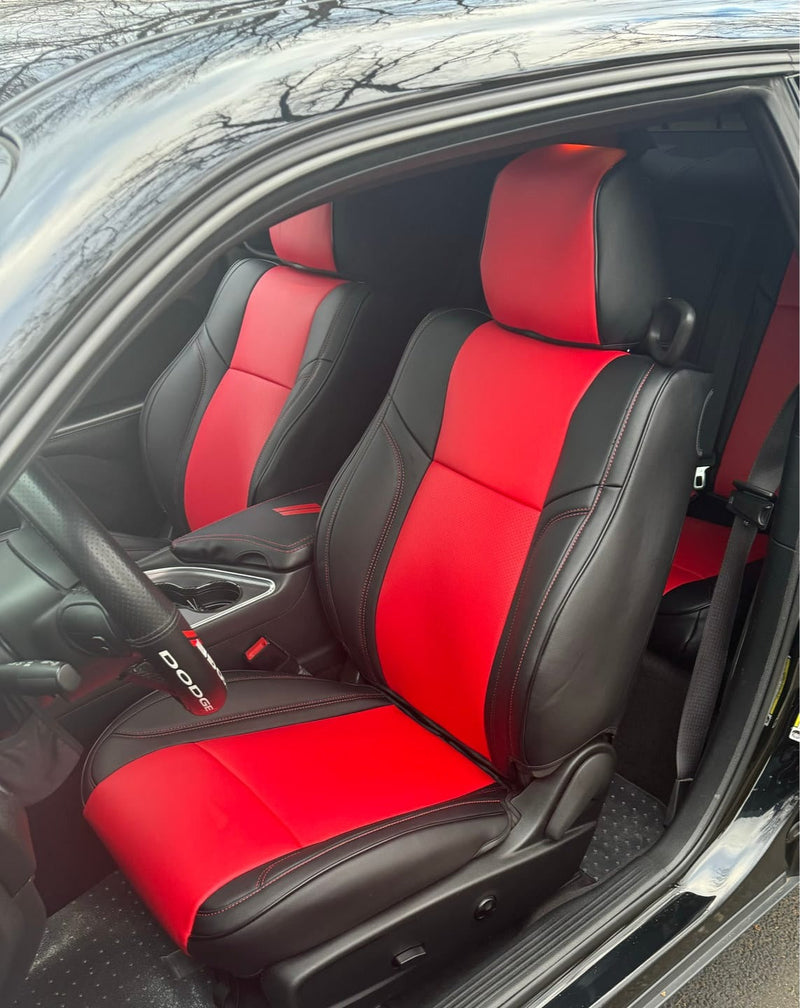 Front seats of 2021 Dodge Challenger with custom red and black artificial Nappa leather seat covers